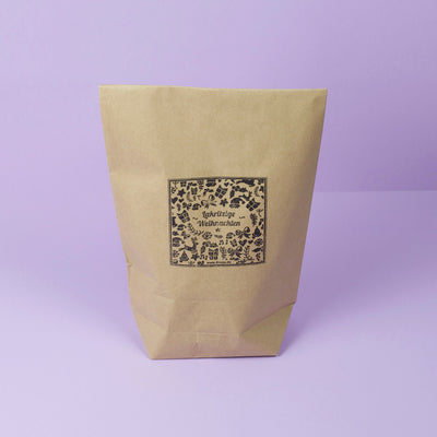 Dekorative Tüte mit vielfältiger Lakritzmischung – enthält Lakritzpastillen, Karamelllakritz, Salmiakpulver, gefüllte Stangen und mehr