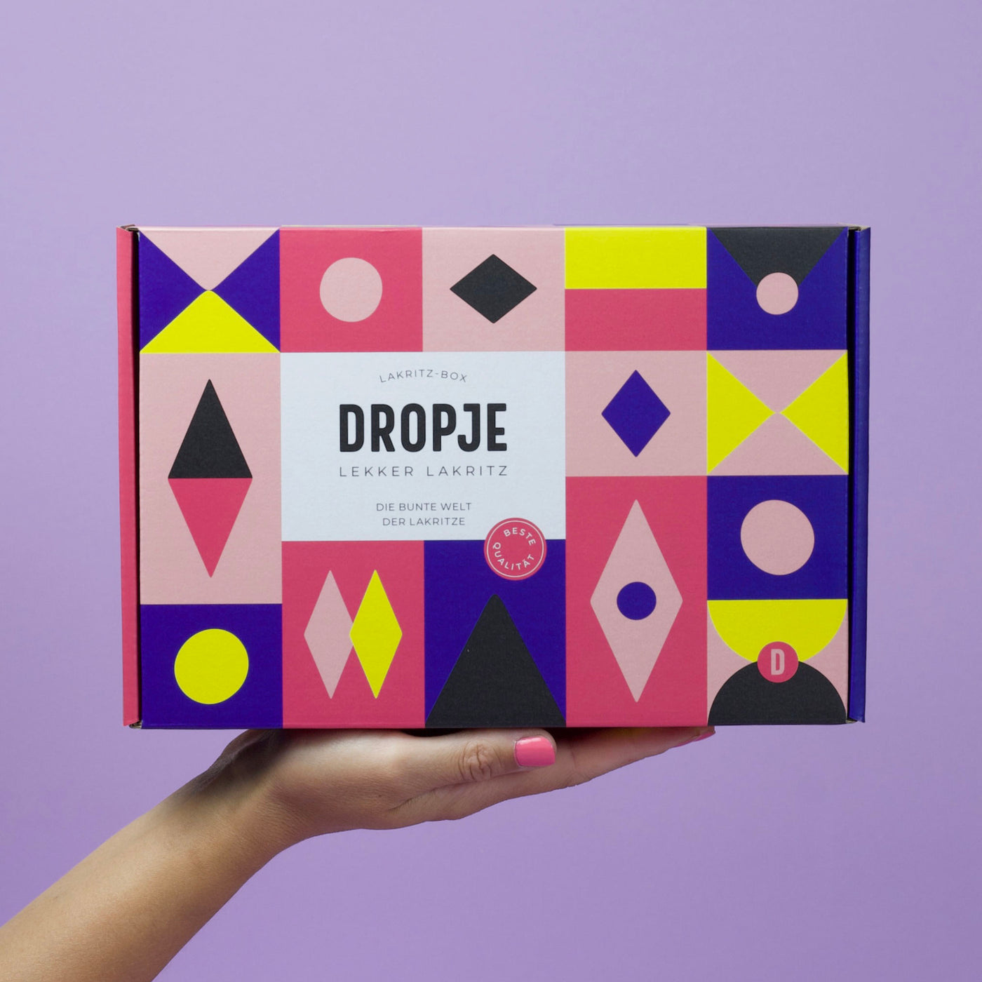 DROPJE Lakritzbox mit farbenfrohem Design – kreative Geschenkbox mit geometrischen Mustern, inspiriert von Lakritzformen